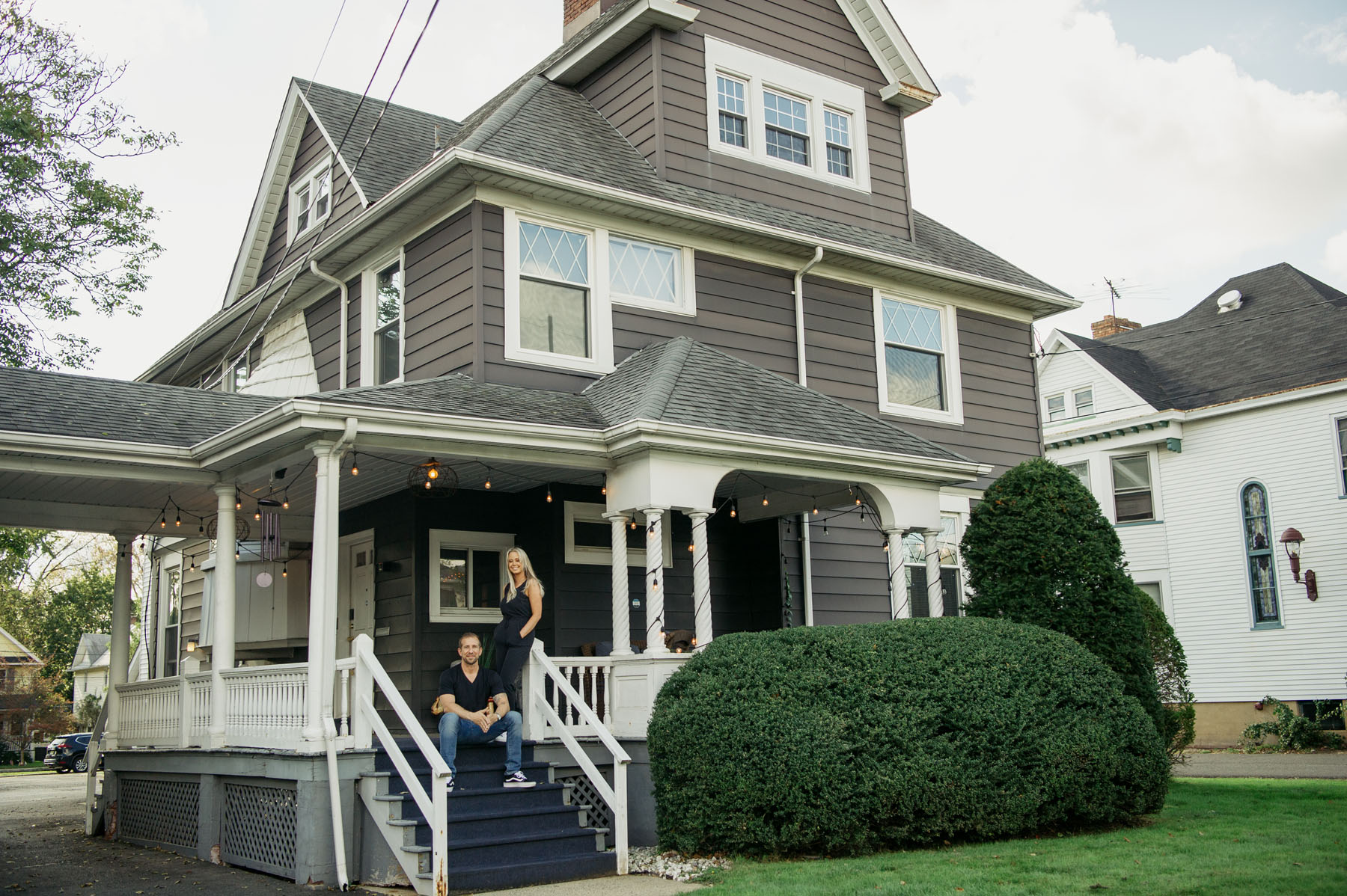 John and Michele Mopper, therapists and owners of Blueprint Mental Health, on the front porch representing mental health culture.