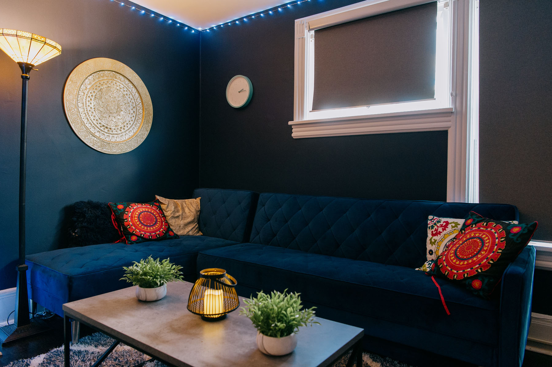 Therapy office at Blueprint Mental Health featuring a blue couch and calming decor for parent mental health support NJ.